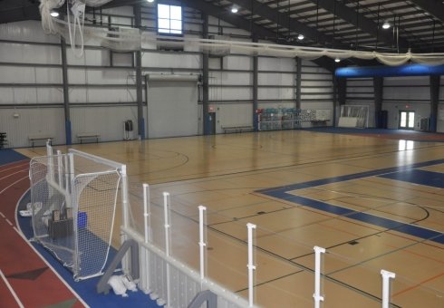 shiny court with white hockey net